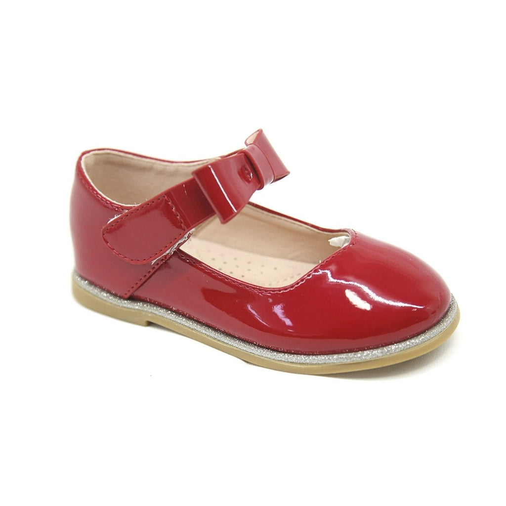 Red bow patent shoe